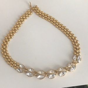 Women’s gold chain with fake diamonds
